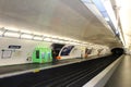 People waiting for metro at Blanche station, famous transport in Paris for rush hour, underground subway. concept Royalty Free Stock Photo