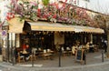 The famous Cafe Le Vrai Paris . It is located in the Montmartre, Paris, France.