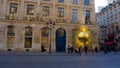 The facade of a fashion shop Louis Vuitton, metal sun
