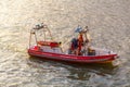 Firefighter team on boat on the Seine River in Paris, France Royalty Free Stock Photo