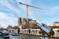 Giant crane on Notre Dame de Paris cathedral in January 2019. Royalty Free Stock Photo