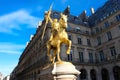 The golden statue of Saint Joan of Arc on the Rue de Rivoli in Paris, France. sculpted by Emmanuel Fremiet in 1864. Royalty Free Stock Photo