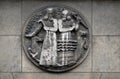 Marduk and Ea. Stone relief at the building of the Faculte de Medicine Paris