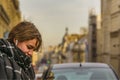 Young woman checking his smartphone