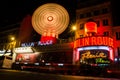 Paris, France - January 22, 2019: The Moulin Rouge by night. Long exposure Royalty Free Stock Photo