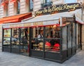 Outdoor enclosed terrace at Bar de la Croix Rouge famous brasserie serving traditional French fare in Paris, France