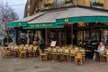 Outdoor seating at Les Deux Magots iconic brasserie serving traditional French fare in Paris, France Royalty Free Stock Photo