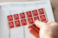 The red stamp of the Post Office, to send a priority letter, has been abolished since January 1, 2023 Royalty Free Stock Photo