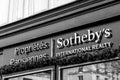 Sotheby`s International Realty`s Paris branch and logo signboard, Paris, France