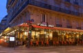 The traditional parisian restaurant Etoile 1903 at night . It located avenue Wagram in Paris, France