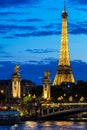 Pont Alexandre III Bridge and Eiffel Tower at night. Paris, Fran Royalty Free Stock Photo