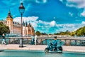 PARIS, FRANCE - JULY 04, 2016 : Castle - Prison Concierges and Exchange Bridge on the Seine in Paris. France