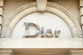 Dior, fashion luxury, silver sign in avenue Montaigne in Paris, France