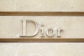 Dior, fashion luxury, silver sign in avenue Montaigne in Paris, France