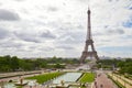 Eiffel Tower in Paris seen from Trocadero in a cloudy day, people and tourists in France Royalty Free Stock Photo