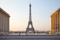 Eiffel tower seen from Trocadero and people walking in the early morning, clear sky in Paris Royalty Free Stock Photo