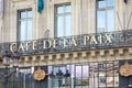 Famous Cafe de la Paix sign in golden letters in Paris, France
