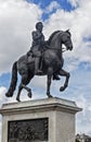 PARIS - Henrici Magni bronze equestrian statue near Pont Neuf. Representing the King of France Henri IV in armor, crowned with lau Royalty Free Stock Photo