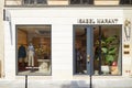 Isabel Marant store with golden letters sign in Paris in a sunny day