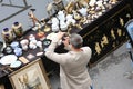 An outdoor flea market in Paris set up on tables at the edge of the Seine