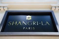 The sign of Shangri-La Hotel, Paris. It is an elegant luxury Palace Hotel In the former home of Prince Roland Bonaparte