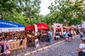 Paris, France - July 22, 2014: Tourists enjoy the evening in Montmartre, the famous artist quarter