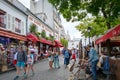 Typical restaurants and artists selling their paintings at the Place du Tertre in Montmartre