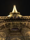 PARIS, FRANCE Ã¢â¬â July 24, 2019: View from below the Eiffel Tower at night. The beams of light, directed from the bottom towards Royalty Free Stock Photo