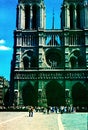 Paris. France-July 1975 : Vintage Analog image. The Notre Dame cathedral facade saint statues. UNESCO World Heritage