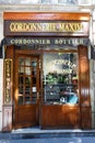 A vintage Artisanal Cobbler shop Maxim located in 18th district of Paris in Montmartre area. Paris. France. Royalty Free Stock Photo