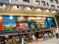 Visitors walk to entrance Gaumont Champs-Elysees movie theater