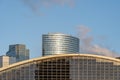 Paris, France - Jun 13, 2020: Skyscrapers Tour EDF behind CNIT facade during sunset Royalty Free Stock Photo