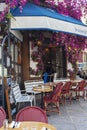 PARIS, FRANCE - JUNE 14, 2022: Cafes and restaurants with a terrace on the street in Paris Royalty Free Stock Photo