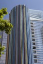 PARIS, FRANCE - June 16, 2022: Cheminee de Moretti. This colorful 32 m high tower is a sculpture in the La DÃÂ©fense district.