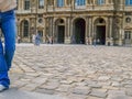 European cobbled courtyard with people