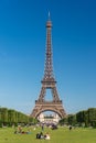 Eiffel Tower from the Champ de Mars gardens in summer. Royalty Free Stock Photo