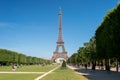 Eiffel Tower from the Champ de Mars gardens in summer. Royalty Free Stock Photo