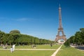 Eiffel Tower from the Champ de Mars gardens in summer. Royalty Free Stock Photo