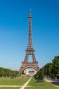 Eiffel Tower from the Champ de Mars gardens in summer. Royalty Free Stock Photo