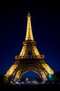 Paris, France - June 01, 2017: Eiffel Tower on night sky. Tower with light illumination. Architecture structure and design concept Royalty Free Stock Photo