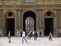 European cobbled courtyard with people