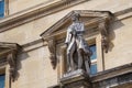 PARIS, FRANCE - JUNE 23, 2017: Georges-Louis Leclerc, Comte de Buffon 1707-1788 statue on the facade of the Louvre. He was a