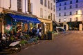 Paris,France, june 2022. Nightlife in a paris bistro. Royalty Free Stock Photo