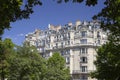 PARIS, FRANCE - June 14, 2022: Parisian residential buildings. Architecture of old Paris, beautiful facade, typical french houses