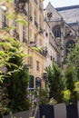 PARIS, FRANCE - June 14, 2022: Parisian residential buildings. Architecture of old Paris, beautiful facade, typical french houses