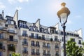 PARIS, FRANCE - June 14, 2022: Parisian residential buildings. Architecture of old Paris, beautiful facade, typical french houses