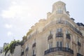 PARIS, FRANCE - June 14, 2022: Parisian residential buildings. Architecture of old Paris, beautiful facade, typical french houses