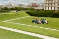 Paris, France 02 June 2018: People enjoying a beautiful summer day in the Park Jardin des Tuileries pl. de la Concorde. Royalty Free Stock Photo
