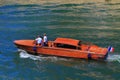 PARIS, FRANCE - JUNE 23, 2017: Red touristic wooden boat on the Seine river Royalty Free Stock Photo