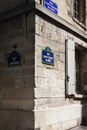 PARIS, FRANCE - June 14, 2022: Paris, France - road sign. Typical Parisian blue sign. Royalty Free Stock Photo